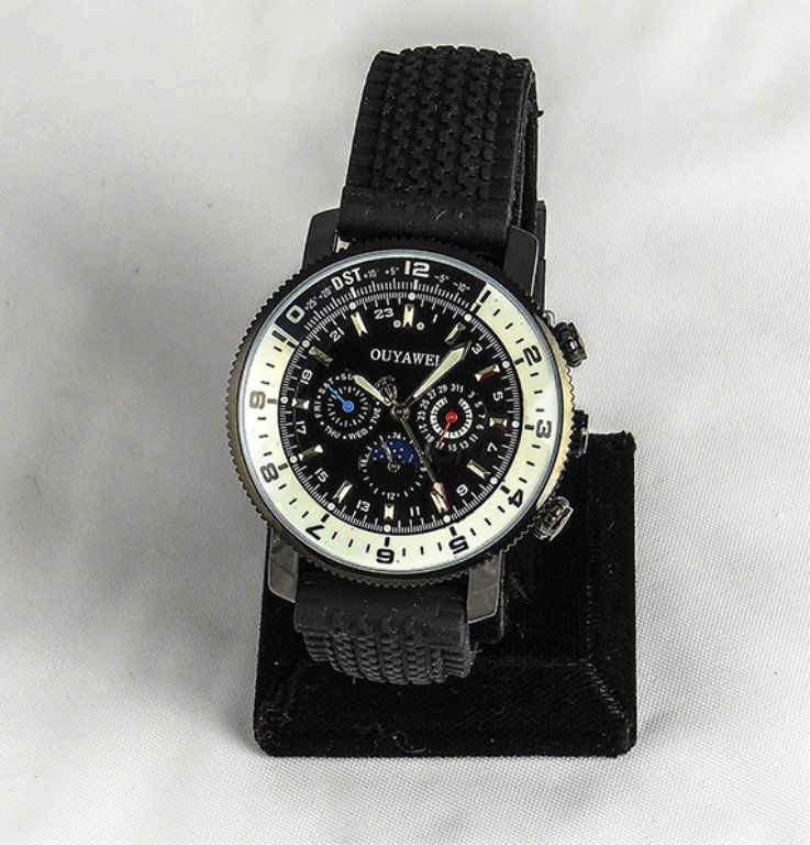 Men's Mechanical Sports Watch: Men's Mechanical Sports Watch. Watch Has A Mechanical Movement With And Analog Display On Black Face. Band Is Rubber Ideal For Sports.