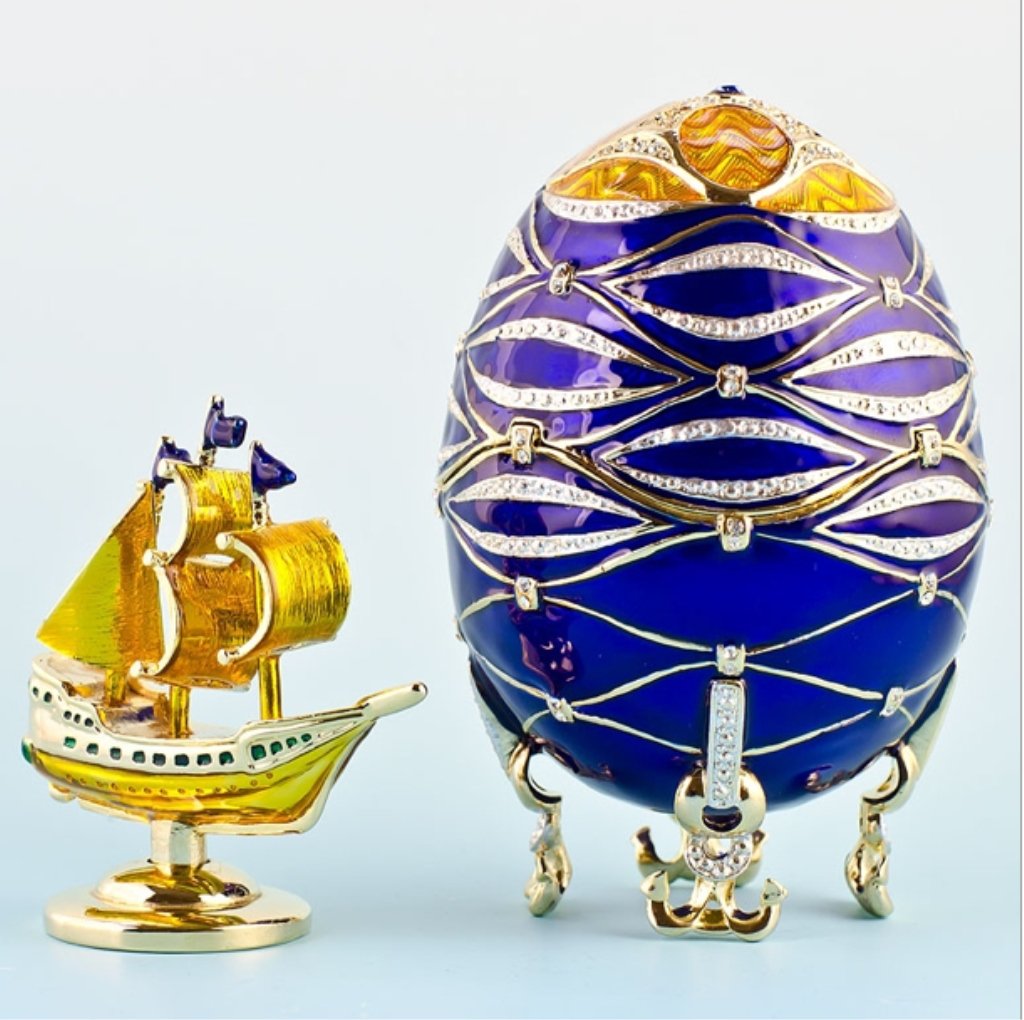 Nautical Faberge Inspired Egg: 4'' (H) X 2.5'' (W) Pewter, Enamel, Crystals Faberge is a trademark of Pallinghurst Resources LLP. This piece of art should not be associated with Pallinghurst Resources LLP, Faberge Limited Co. who a