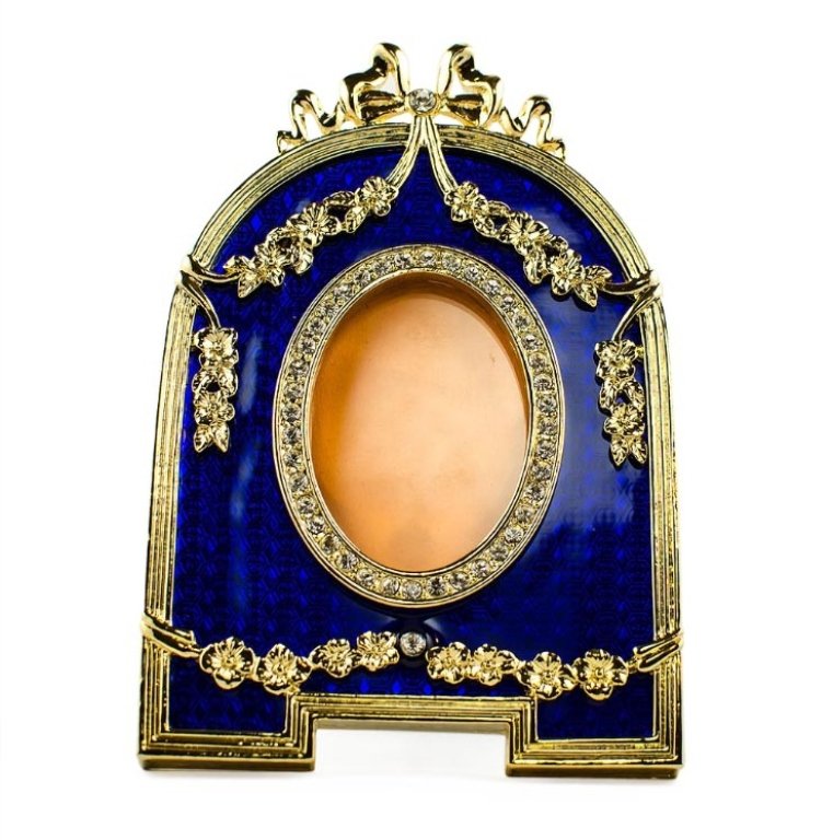 Blue Enameled Guilloche Faberge Inspired Frame: Blue Enameled Guilloche Faberge Inspired Frame, Dimensions: 4.5'' (H) x 3.75'' (L) Photo Opening Dimensions: 1.75" (H) 1.25" (W) Pewter, Enamel, Crystals