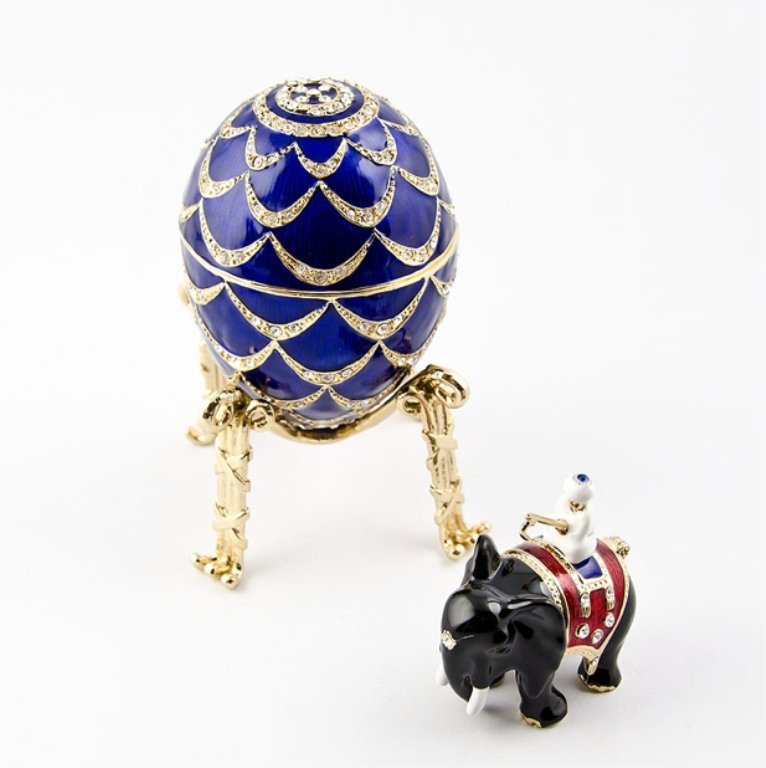 Indian Mahout Faberge Inspired Egg: The Pine Cone egg is a jewelled enameled Easter egg made under the supervision of the Russian jeweler Peter Carl Faberge by workmaster Mikhail Perkhin in 1900.The egg was made for Alexander Kelch, who