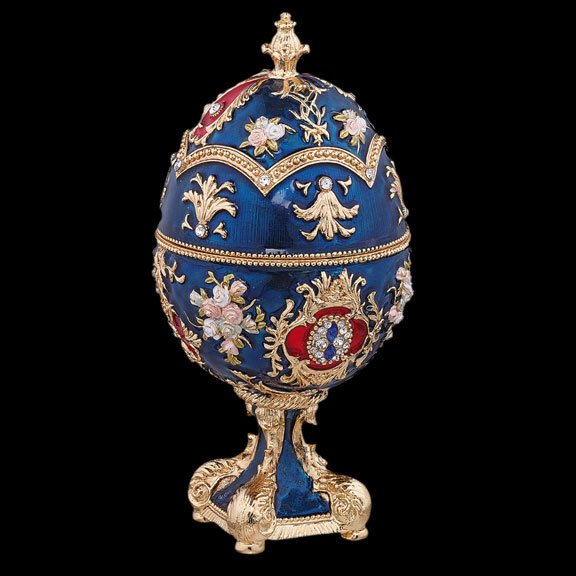 Faberge Inspired Royal Blue Egg: Faberge Inspired Royal Blue Egg, Fashioned more than a century ago by Faberge, jeweler to Russian Czarina Maria, our replica collectibles boast the same intricate metalwork, lost wax metal-casting, ha