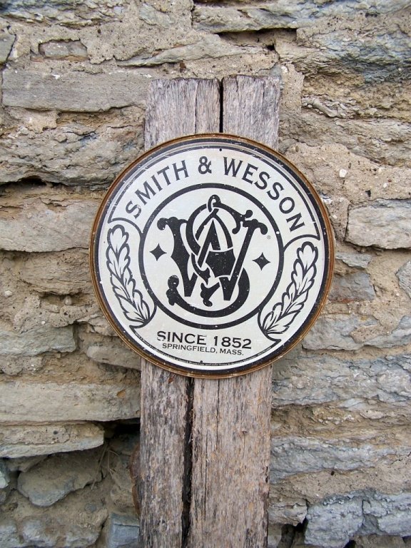 Vintage Style Smith & Wesson Guns Metal Sign: Vintage Style Smith & Wesson Guns Metal Sign, 12" diameter