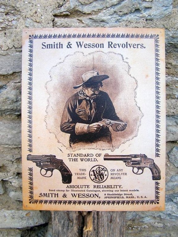Vintage Style Smith & Wesson Metal Sign: Vintage Style Smith & Wesson Metal Sign, measures 16in x 12in