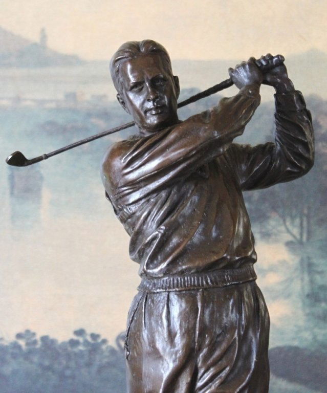 Striking Bobby Jones Golfer Bronze Sculpture: Striking Bobby Jones Golfer Bronze Sculpture After Ron Tunison 15.5H x 6.5W x 6.5D 14 lbs. This bronze sculpture was produced using the "Lost Wax" casting method. The "Lost Wax" Cast method is the mos