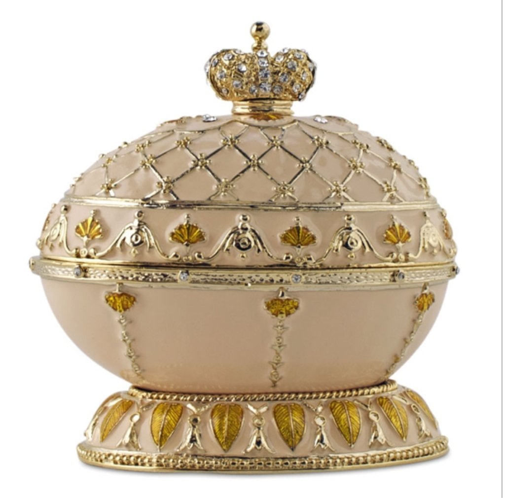 Renaissance Faberge Inspired Egg: History: Carved from a block of milky agate, mounted on a gold enameled base, egg was closely modeled after an seventeenth-century box by Le Roy, Germany. A highly intriguing hypothesis has recently b