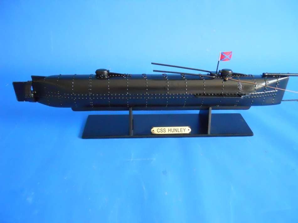 H. L. Hunley Limited 24" Model Ship: H. L. Hunley Limited 24" Model Ship. Highly-detailed hatches. Harpoon torpedo with arming rope. Individual hull plates and rivets clearly visible. 24" L x 2" W x 8" H (1:30 scale).