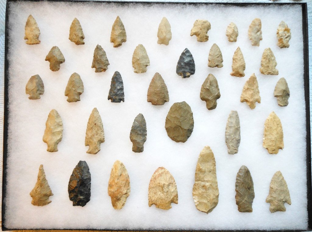 American Indian Arrowhead - 38 Piece Collection: Very nice mixture of 38 piece Authentic Native American Indian Point and Scraper collection from Michigan that comes in a 12" X 16" glass covered Riker Case. The largest one measures 3-1/2" long by 1-