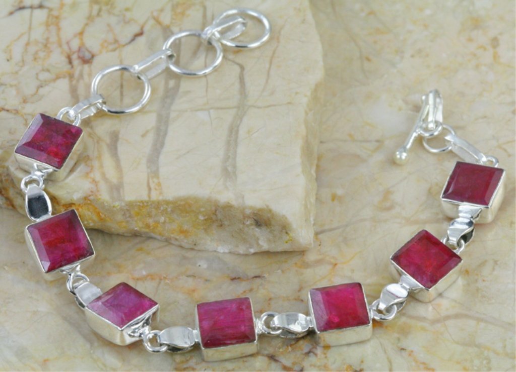 Gorgeous Ruby and Sterling Silver Bracelet: Gorgeous Ruby and Sterling Silver Bracelet , 66 Carats. Measures, 6 1/4 - 7 1/2" inches.