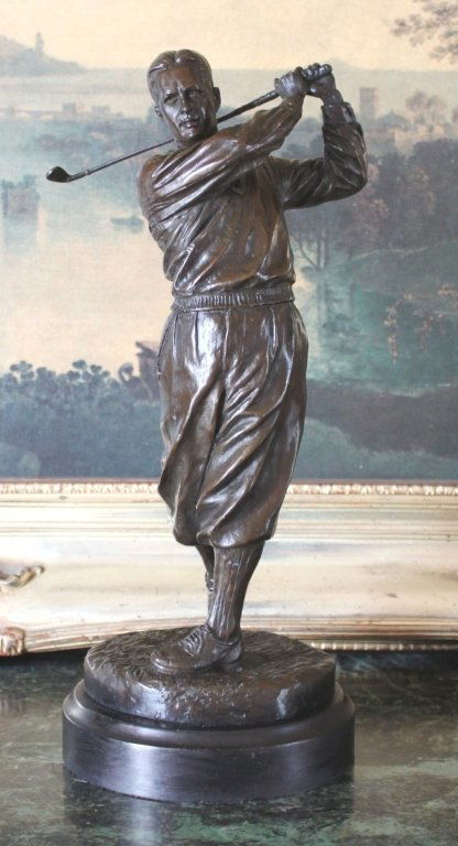 Striking Bobby Jones Golfer Bronze Sculpture: Striking Bobby Jones Golfer Bronze Sculpture After Ron Tunison 15.5H x 6.5W x 6.5D 14 lbs. This bronze sculpture was produced using the "Lost Wax" casting method. The "Lost Wax" Cast method is the mos