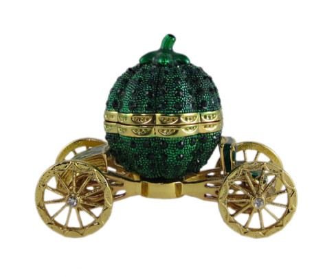 Faberge Inspired Jewelry Trinket Box: Faberge Inspired Gold bejeweled and green pumpkin coach jewelry trinket box. Faberge is a trademark of Pallinghurst Resources LLP. This piece of art should not be associated with Pallinghurst Resource
