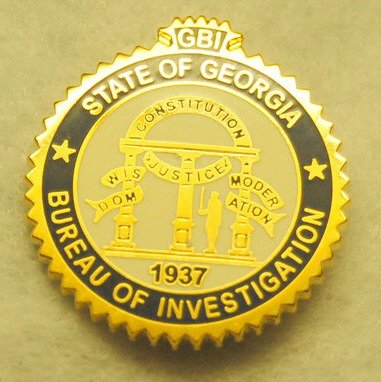 State of Georgia Bureau of Investigation Lapel Pin: State of Georgia Bureau of Investigation Lapel Pin. Gold toned metal with blue and white polished enamel. 7/8"diam.