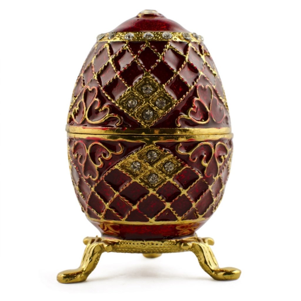 CarrÃ© Faberge Inspired Egg: CarrÃ© Faberge Inspired Egg, This sparkling Faberge-inspired egg is adorned with clear crystals and high-polished enamel with golden trim. It opens on a hinge and has a magnetic closure to keep the 