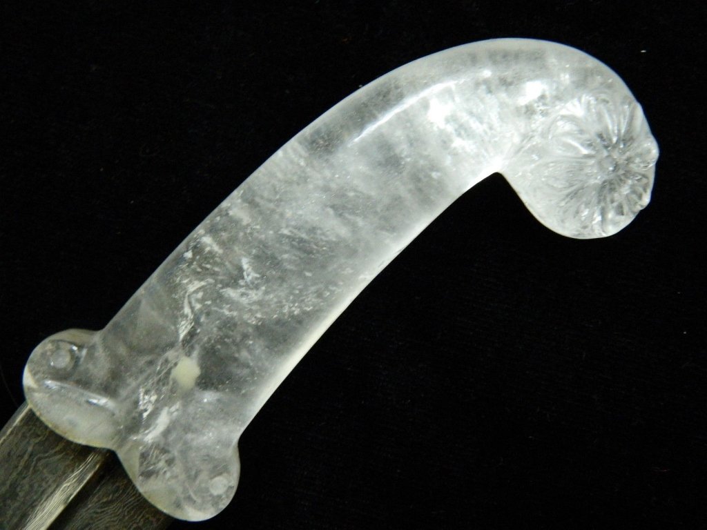 Damascus Blade w/ Rock Crystal Handle: Damascus Blade w/ Rock Crystal Handle. Damascus steel blade. Rock crystal Mughal shaped handle. 14".