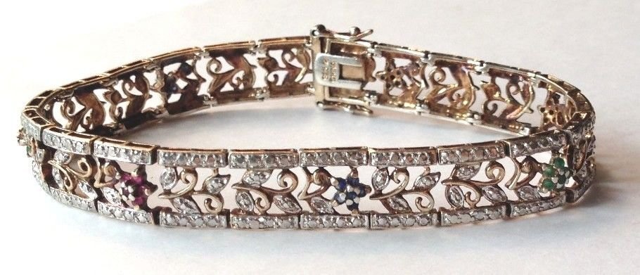 Vintage Gold over Sterling Multi Gem Link Bracelet: Vintage Gold over Sterling Multi Gem Link Bracelet. Sapphire Ruby Emerald Flower Link Bracelet. 7.5" x 10mm. 16.3g.