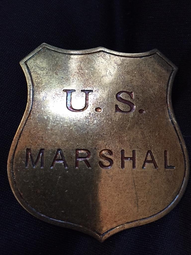 Movie Prop Replica U.S. Marshall Badge: Movie prop replica, Western badge. U.S. Marshal. Pin back wearable in good condition. 2" W X 2 1/2" L.