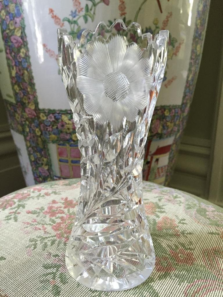 Late 19th / Early 20thc Cut Glass Vase: American Brilliant Period ( 1890 - 1910 ) cut crystal corset shaped vase. Intaglio daisy with branches & leaves pattern & star design bottom. 8" H X 3 1/2" D at base.