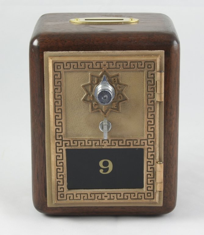 Hand-made Walnut Post Office Door Safe Bank: Made from an authentic US post office door. Nice little heavy weight, ( 2lbs 10oz ) walnut with brass coin slot, Grecian design on solid brass door with lettered combination wheel & #9 on glass door o