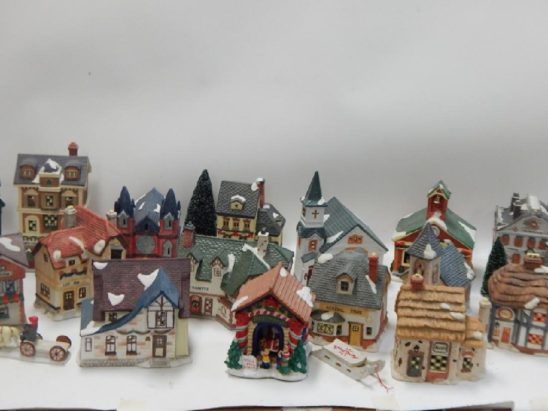 LARGE COLLECTION OF PORCELAIN VILLAGE BUILDINGS: LARGE COLLECTION OF PORCELAIN VILLAGE BUILDINGS, TREES, FIGURES, AND ORNAMENTS