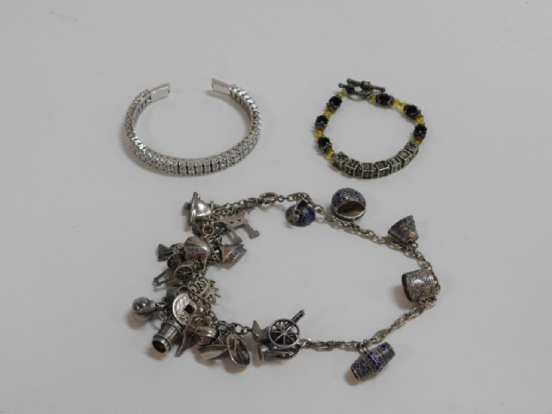 THREE STERLING SILVER BRACELETS. (1 of 4)