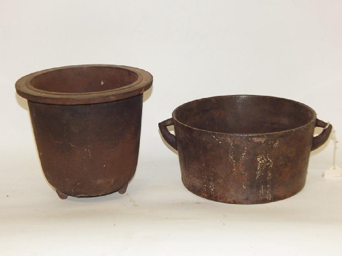 TWO CAST IRON COOKING POTS (1 of 4)