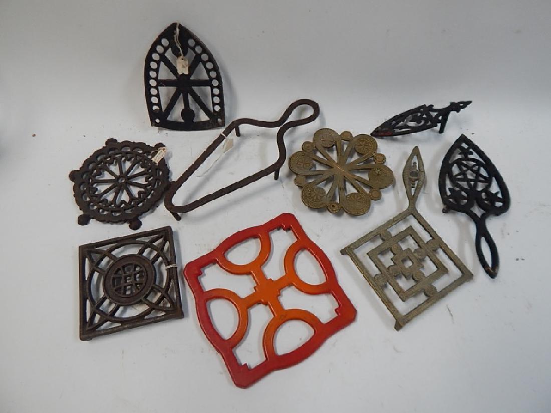 LOT OF NINE TRIVETS: 9 TOTAL, DIFFERENT SHAPES AND SIZES