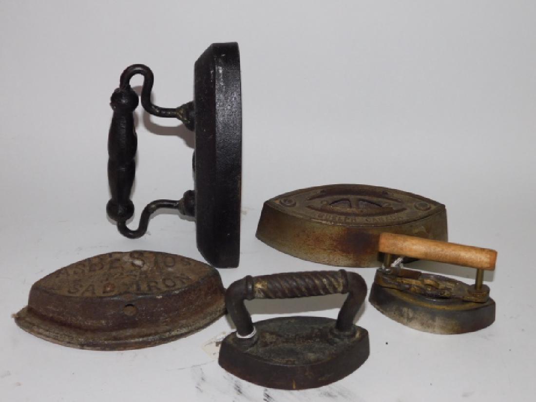 LOT OF HAND IRONS: LARGEST IS 7"