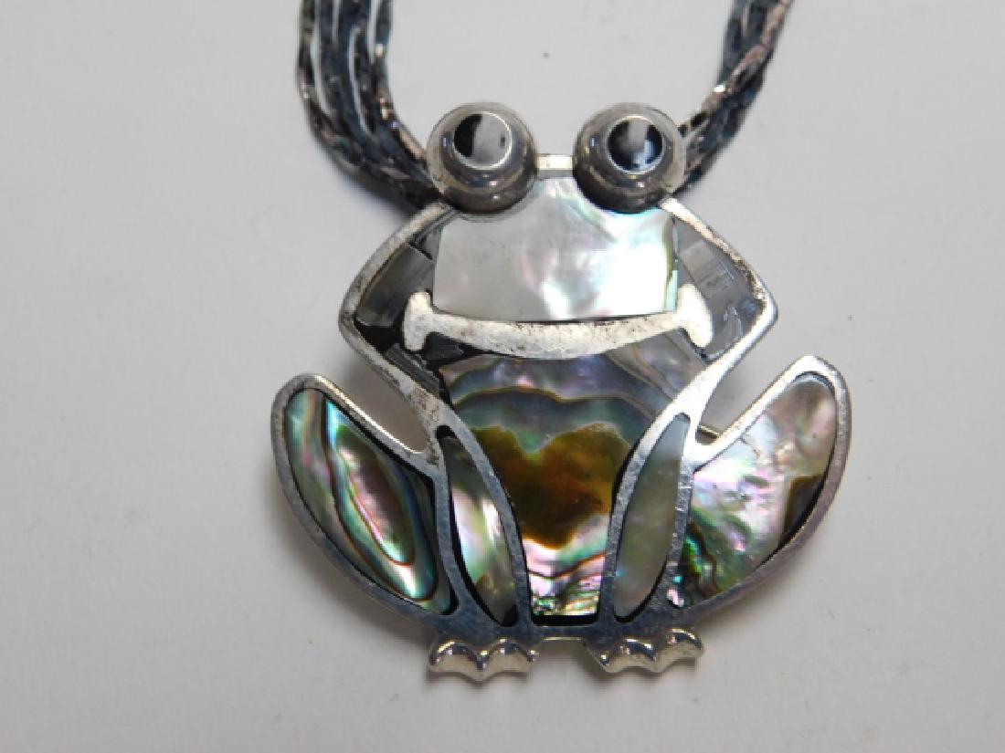 STERLING SILVER FROG NECKLACE: INLAID ABALONE FROG PENDANT. PIN/PENDANT IN ONE. MARKED TS 145 MEXICO 950. 1.5OZ