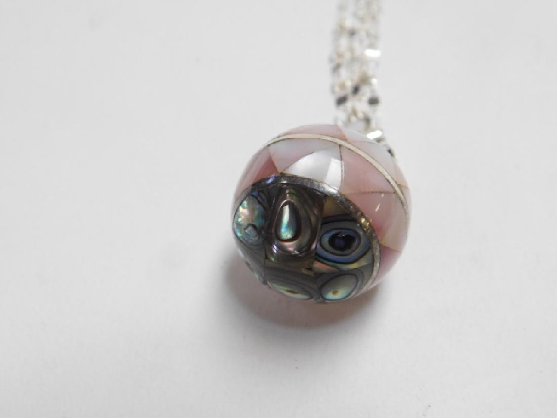 INLAID BALL PENDANT WITH ABALONE ON CHAIN: 60" LONG CHAIN. 0.7OZ