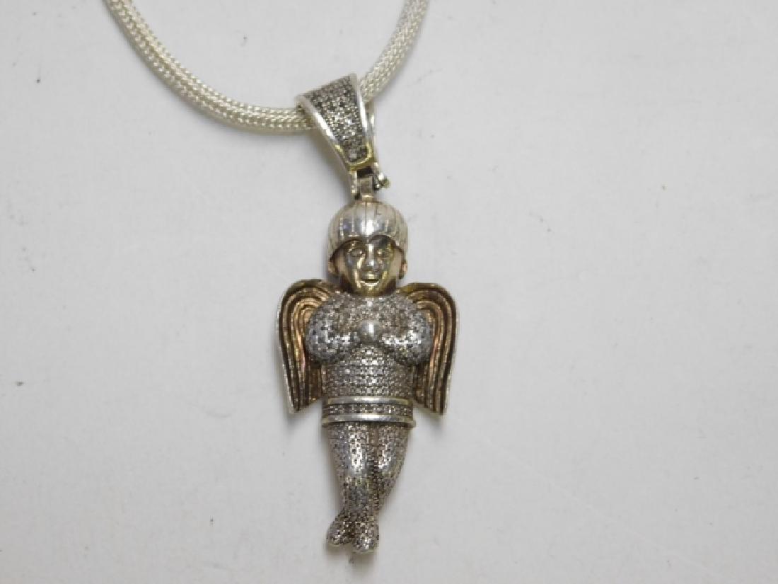 ONE STERLING SILVER ANGEL PENDANT WITH MARCASITE: ON 18" CHAIN. 0.3OZ
