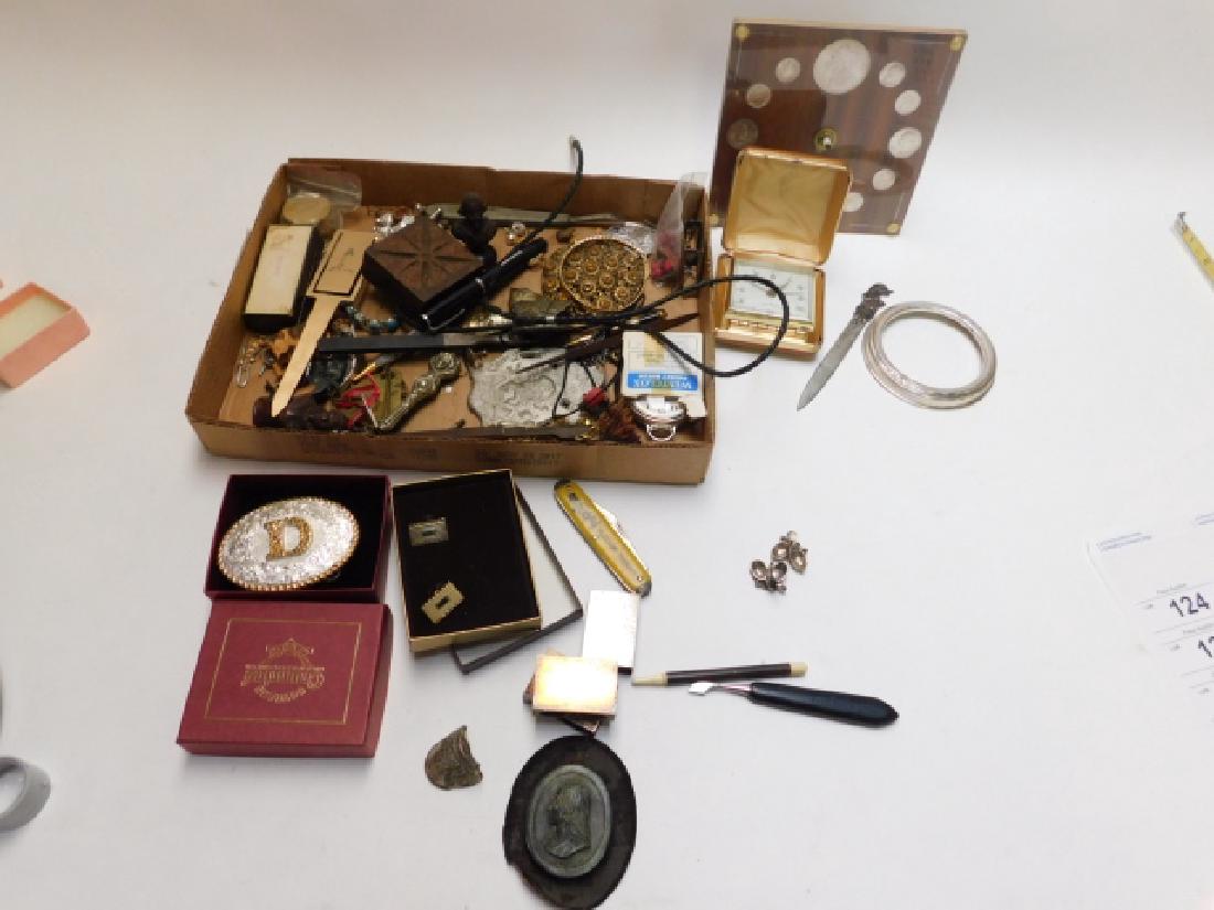 COLLECTION OF DRAWER FINDS: COINS, POCKET KNIFE, BELT CLIPS, AND SO MUCH MORE.