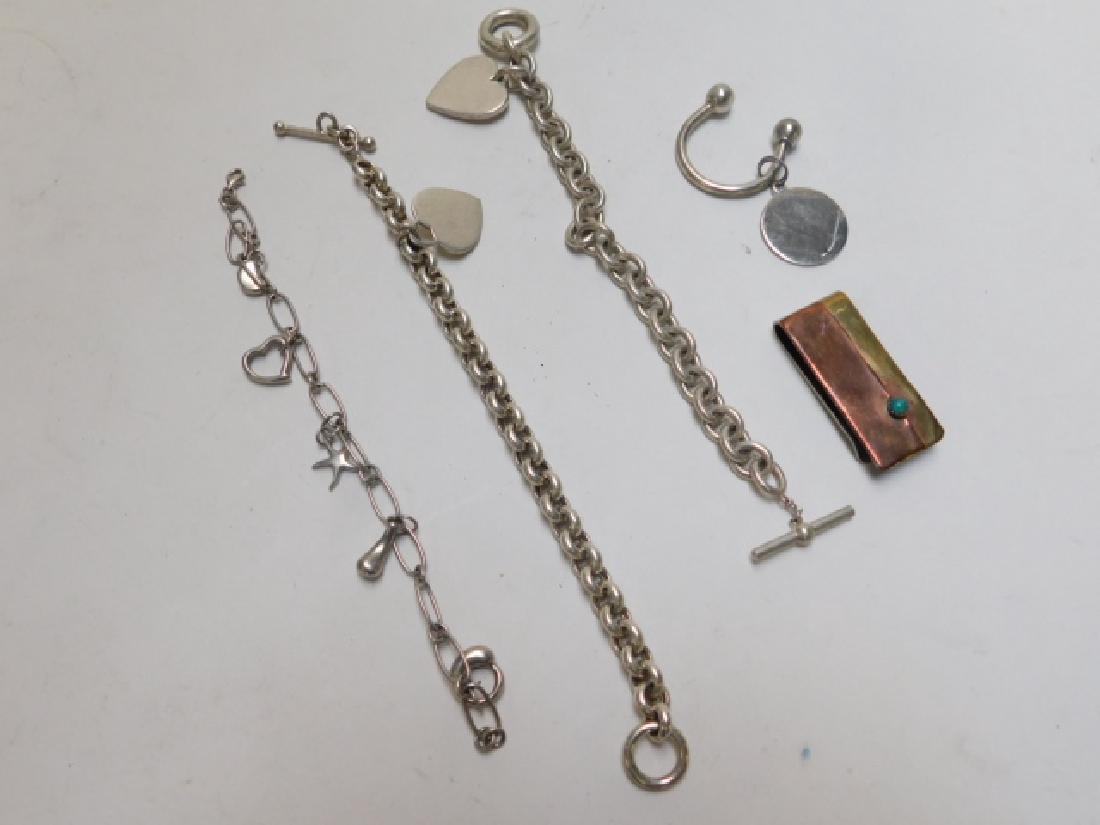 STERLING SILVER BRACELETS AND KEY CHAIN: LONGEST BRACELET IS 7". ALONG WITH NON-SILVER MONEY CLIP. 3.2OZ