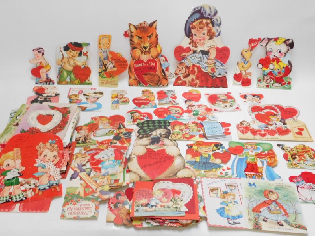 COLLECTION OF OLD VALENTINE CARDS: INCLUDES CUT OUTS, FOLDING CARDS. DIFFERENT SIZES AND SHAPES. LARGE FOX AT TOP HAS TAPE ON IT. ALSO INCLUDES OTHER CARDS BESIDES VALENTINES