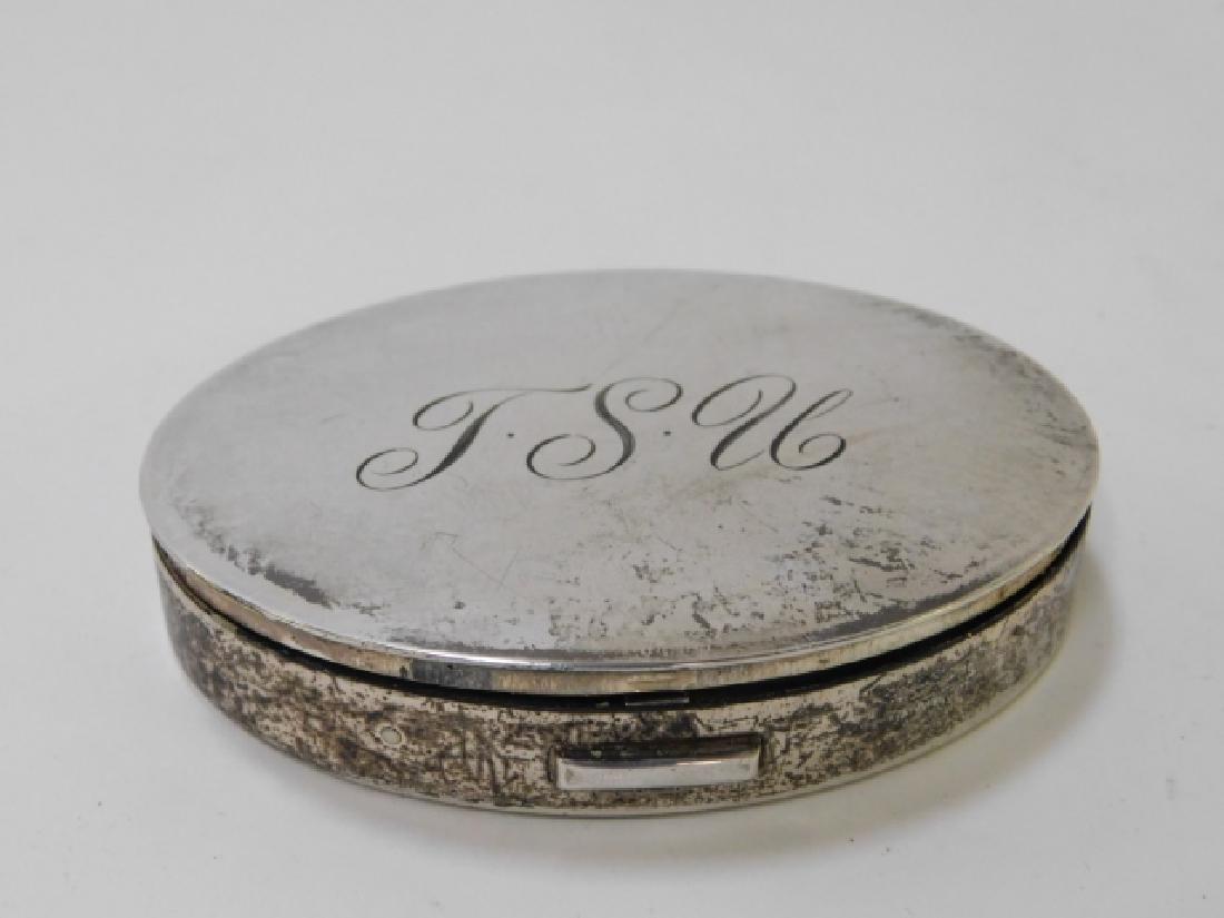 STERLING SILVER COMPACT: ENGRAVED ON TOP WITH INTIALS TSU.
