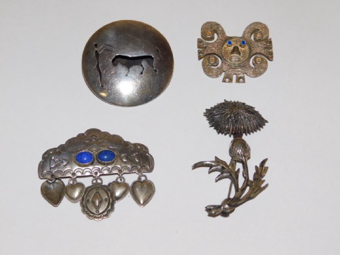 FOUR STERLING SILVER PINS (1 of 1)