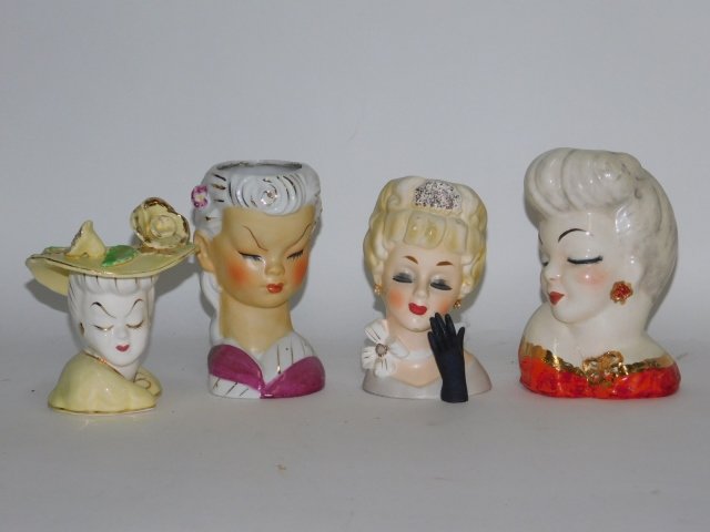 FOUR HEAD VASES (1 of 6)