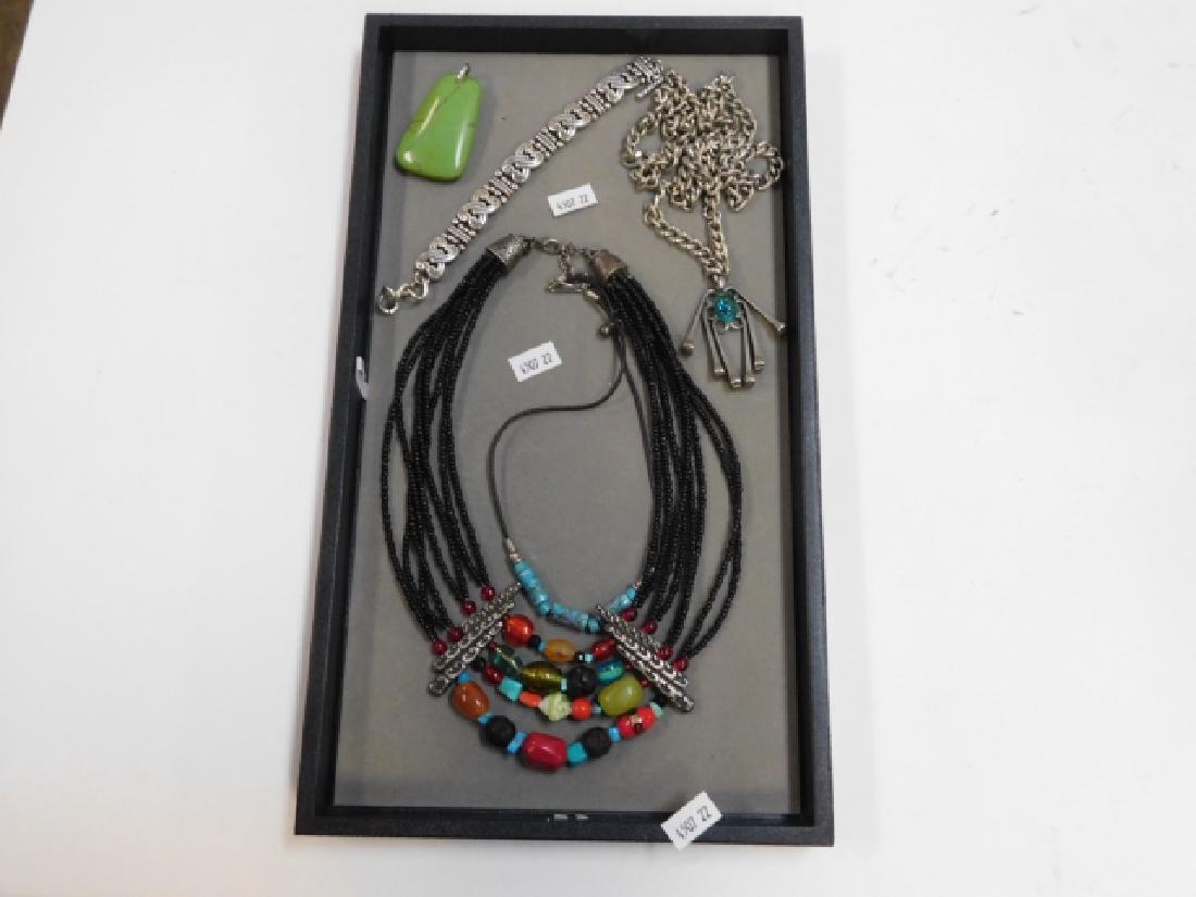 COLLECTION OF COSTUME JEWELRY: UNIQUE AND INTRIGUING LOT OF COSTUME JEWELRY. BEADED NECKLACES, BRACELET, AND CHARM.