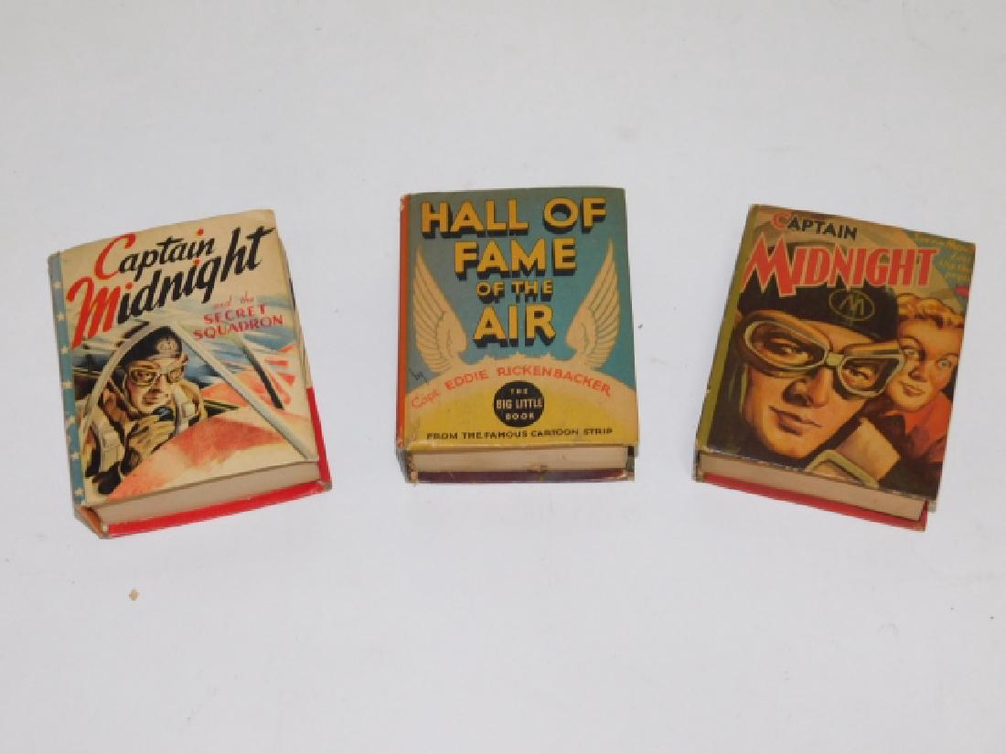 COLLECTION OF BIG LITTLE BOOKS: POCKET SIZE- ROUGHLY 4 1/2" BY 3 3/4" BOOKS INCLUDING HALL OF FAME OF THE AIR, WITH TWO CAPTAIN MIDNIGHT BOOKS, CAPTAIN MIDNIGHT AND CAPTAIN MIDNIGHT AND THE SECRET SQUADRON. MINOR TEARS ON OUTER BIND