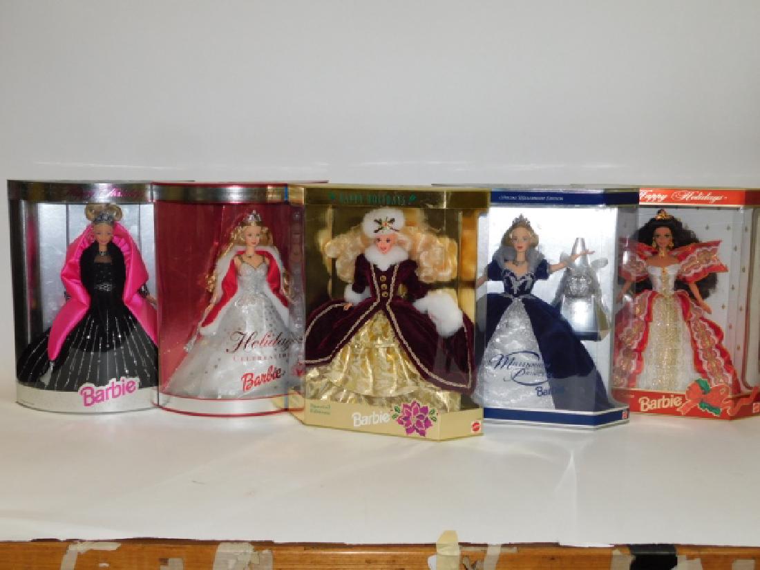 FIVE HOLIDAY BARBIE DOLLS: NEW IN BOX. BOXES/PLASTIC IS SLIGHTLY DAMAGED