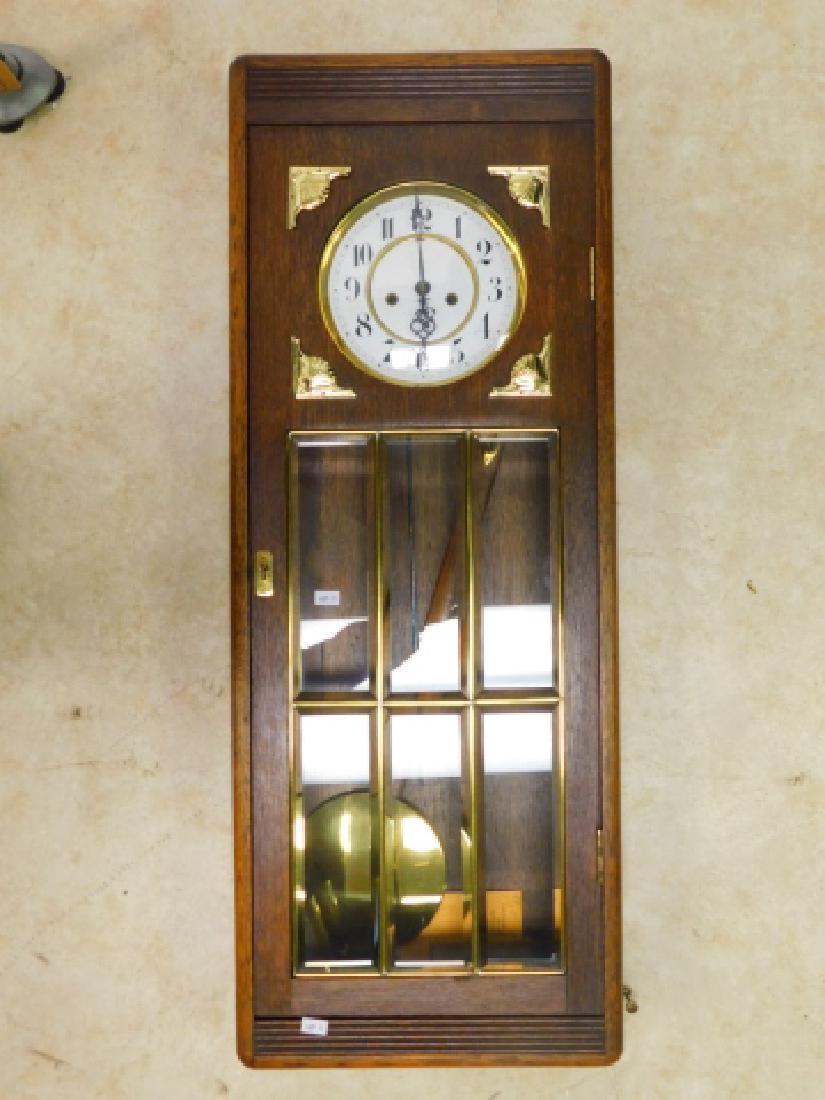 ENGLISH WALL CLOCK: WITH KEY, PENDULUM, AND WEIGHTS. APPROX 34" BY 14".