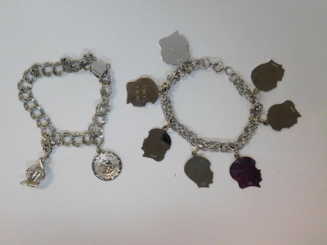 TWO STERLING SILVER CHARM BRACELETS: 1.3OZ