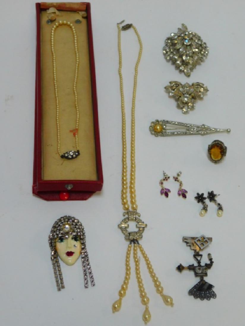 COLLECTION OF VINTAGE COSTUME JEWELRY: AS IS LOT. RHINESTONE BROOCHES, PIERCED EAR EARRINGS, NECKLACES, PIN AND RING.