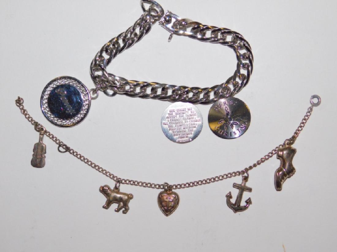 TWO STERLING SILVER CHARM BRACELETS: 1.3OZ.