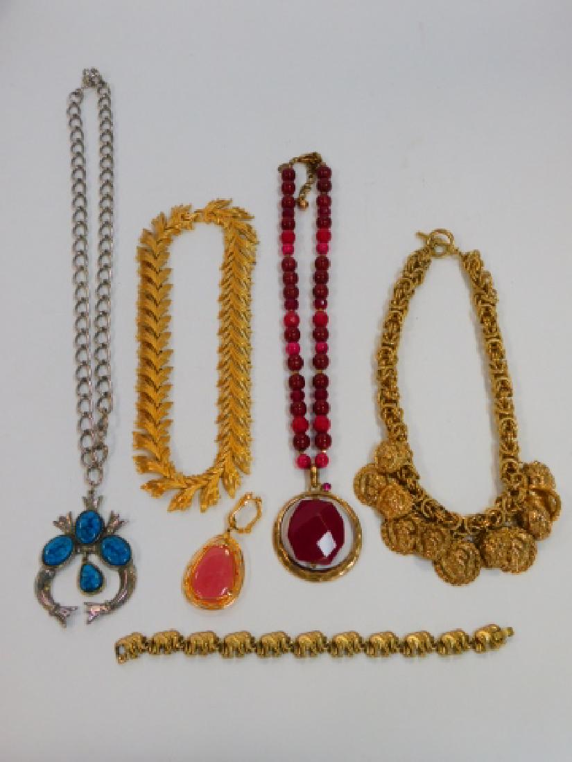 COLLECTION OF VINTAGE COSTUME JEWELRY: ELEPHANT BRACELET, PENDANTS, AND NECKLACES