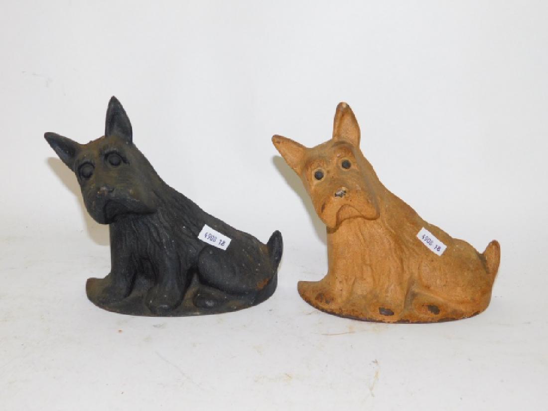 TWO CAST IRON DOG DOOR STOPS: BLACK AND WHITE SCOTTIES