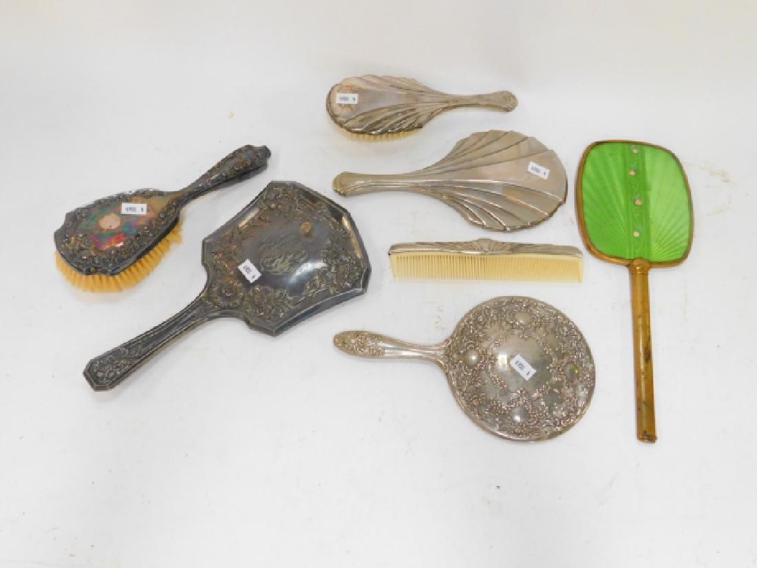 COLLECTION OF DRESSER MIRRORS AND BRUSHES: INCLUDES 3PC MIRROR, BRUSH, AND COMB SET -MIRROR IS OUT OF HANDLE, WITH DAMAGE TO MIRROR. ALONG WITH 2PC BRUSH AND MIRROR SET AND OTHERS.