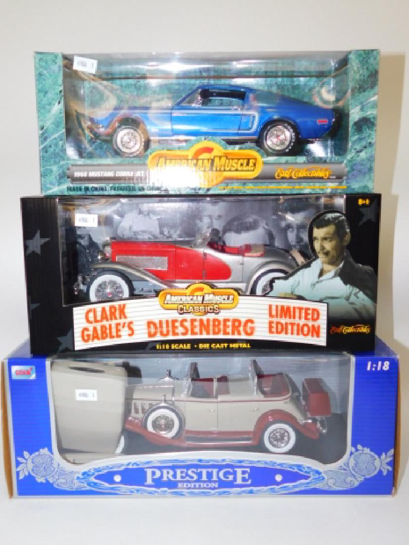 LOT OF THREE MODEL CARS: NEW IN BOX. INCLUDES: 1968 MUSTANG COBRA JET, CLARK GABLE'S DUESENBERG, AND 1932 CADILLAC SPEED PHAETOM.