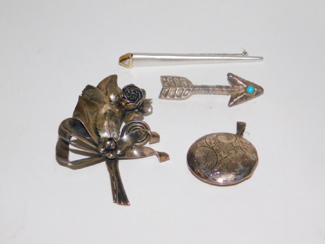 STERLING SILVER PINS AND LOCKET: NICE CONDITION. MARKED 925. THREE PINS ALONG WITH A PENDANT/LOCKET