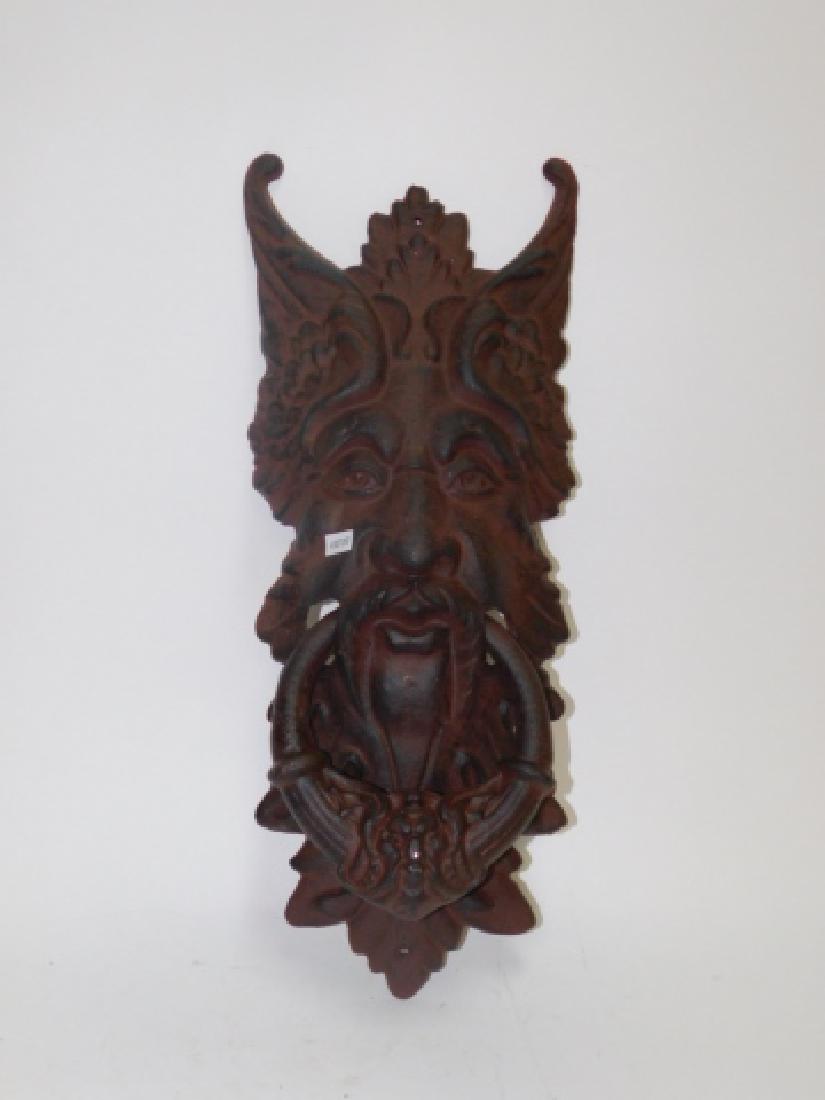 CAST IRON DOOR KNOCKER: APPROX 19" LONG.
