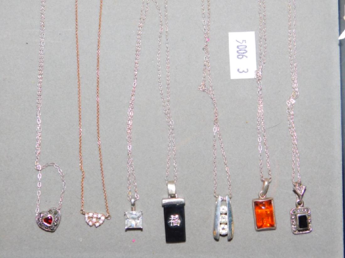 SEVEN STERLING SILVER NECKLACES WITH PENDANTS (1 of 2)