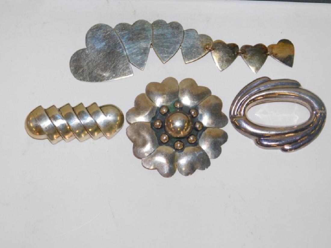 FOUR STERLING SILVER PINS (1 of 1)